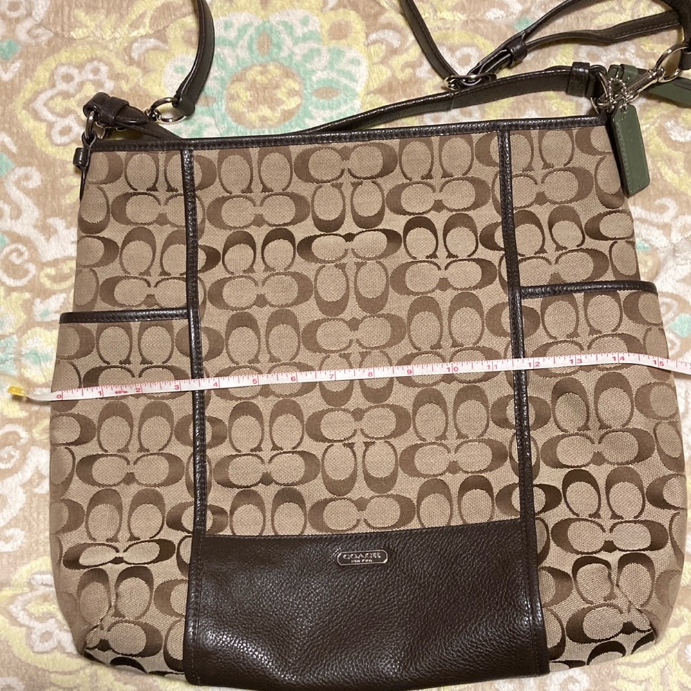 Coach tote/ shoulder/ crossbody bag with leather trim.